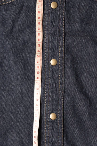 Ruban à mesurer et texture de jean — Photo