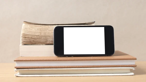 Stack of book and smart phone — Stock Photo, Image