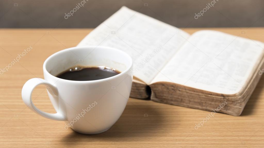 open book with coffee