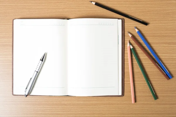 Pen on open notebook — Stock Photo, Image