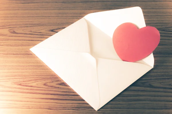 Red heart with pink envelope — Stock Photo, Image