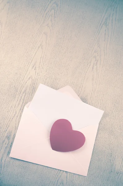 Red heart with pink envelope — Stock Photo, Image