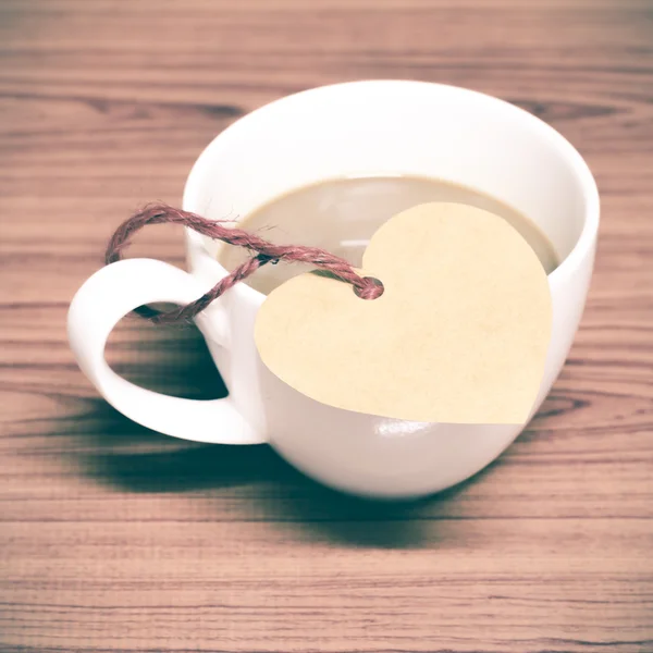 Coffee cup with heart tag — Stock Photo, Image