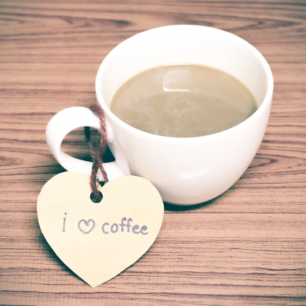 Coffee cup with heart tag