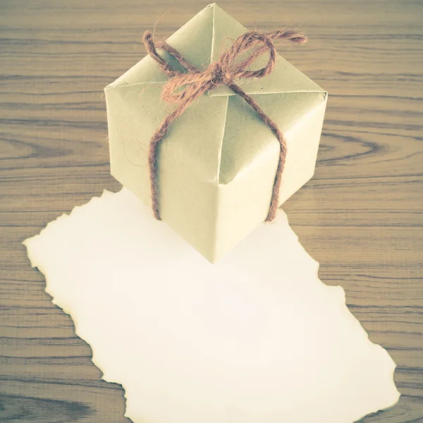 Gift box with paper — Stock Photo, Image