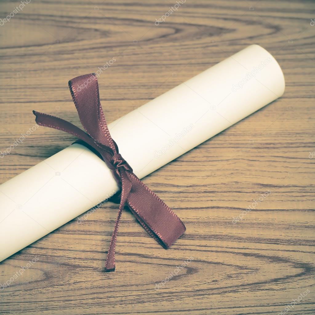 White diploma with ribbon