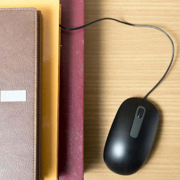 book and computer mouse