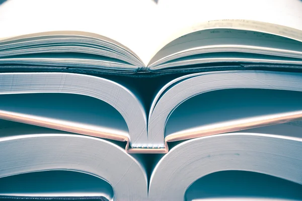 Open books on table — Stock Photo, Image