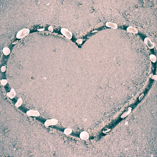 Heart on sand at the beach — Stock Photo, Image