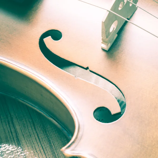 Violin on wood background — Stock Photo, Image