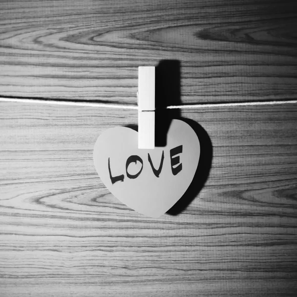 Red heart on wood background black and white color tone style — Stock Photo, Image