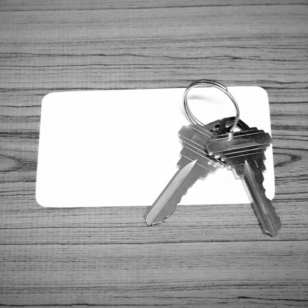Visitekaartje en sleutels zwarte en witte kleur Toon stijl — Stockfoto