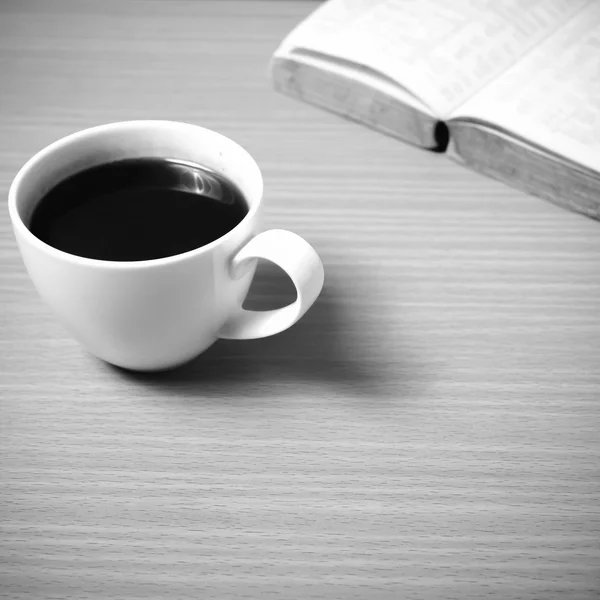 Open book with coffee black and white color tone style — Stock Photo, Image