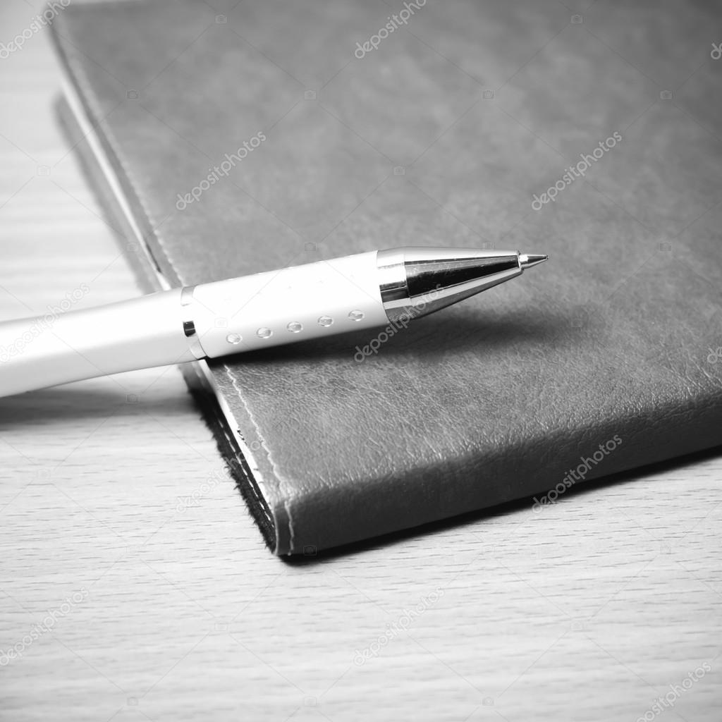 book and pen black and white color tone style