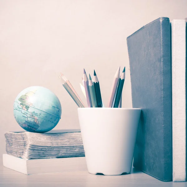Book and earth ball with color pencil vintage style — Stock Photo, Image