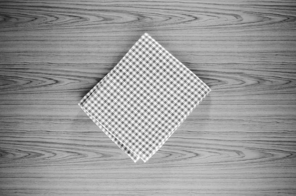 Kitchen towel on wood background black and white color tone styl — Stock Photo, Image