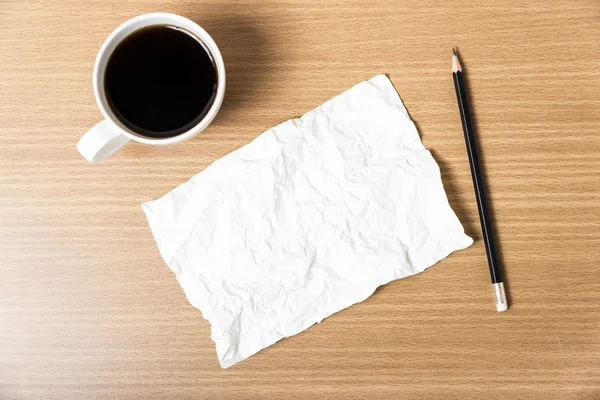 Papier en potlood en koffiekopje — Stockfoto