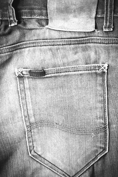 Etikett auf Jeanshose schwarz und weiß Farbton Stil — Stockfoto