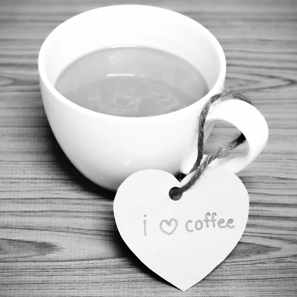 Coffee cup with heart tag write I love coffee word black and whi — Stock Photo, Image