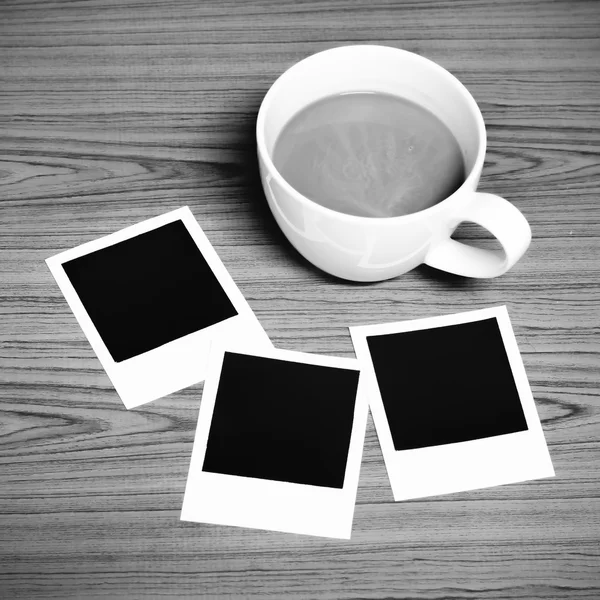 Coffee cup with photo frame black and white color tone style — Stock Photo, Image