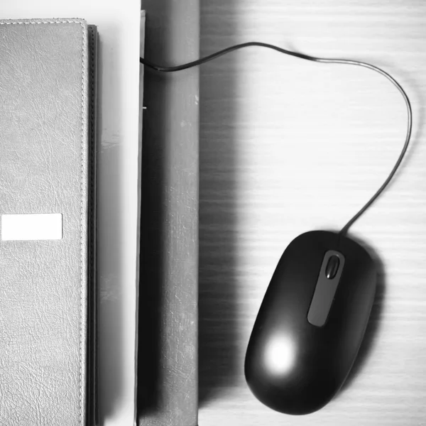 book and computer mouse black and white color tone style