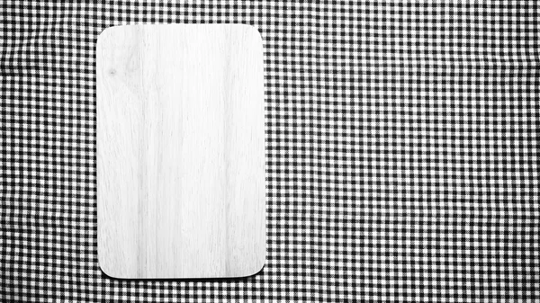 Skära styrelsen på kök handduk svart och vit färg tonar stil — Stockfoto