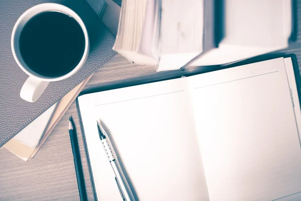 Open notebook with coffee cup — Stock Photo, Image