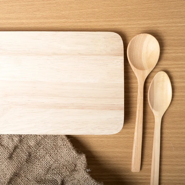 Tagliere e cucchiai di legno — Foto Stock