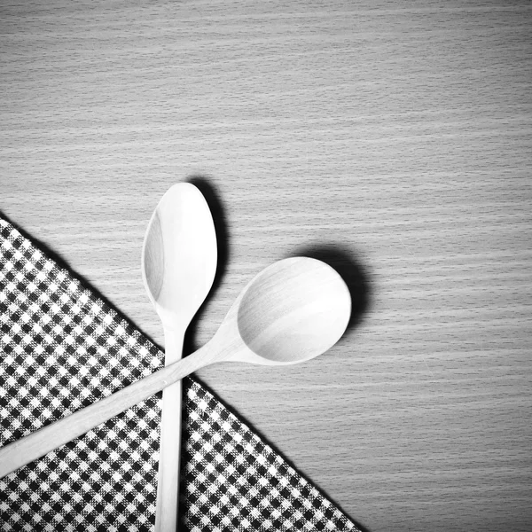 Wooden spoons and kitchen towel — Stock Photo, Image