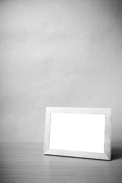 Picture frame on table — Stock Photo, Image