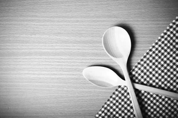Wooden spoons and kitchen towel — Stock Photo, Image