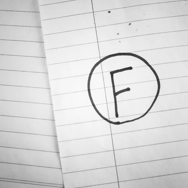 Grade f on line paper — Stock Photo, Image