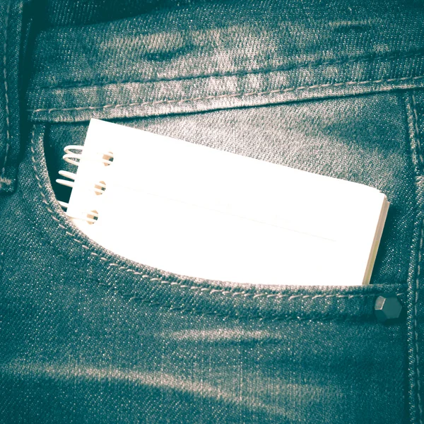 Papel notebook no bolso jean — Fotografia de Stock