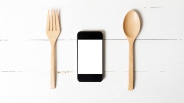 kaşık ve akıllı telefon kavramı sosyal yeme