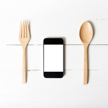 kaşık ve akıllı telefon kavramı sosyal yeme
