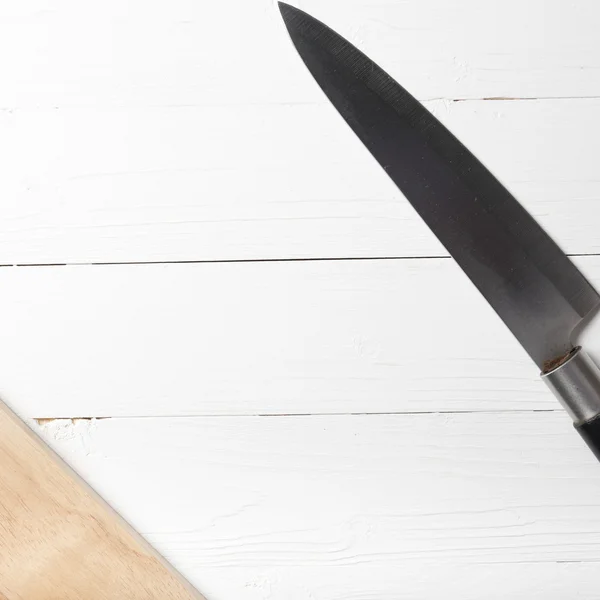 Kitchen knife on cutting board — Stock Photo, Image