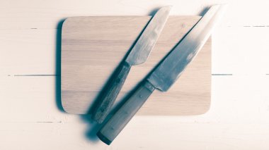 kesme tahtası vintage tarzı üzerinde mutfak bıçağı