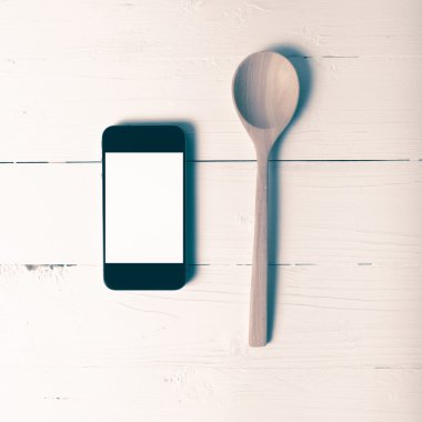 kaşık ve sosyal vintage tarzı yeme akıllı telefon genel kavram