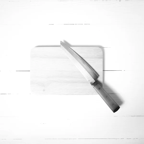 Knife and cutting board black and white tone — Stock Photo, Image