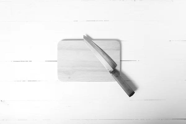 Mes en snijden boord van zwarte en witte Toon — Stockfoto