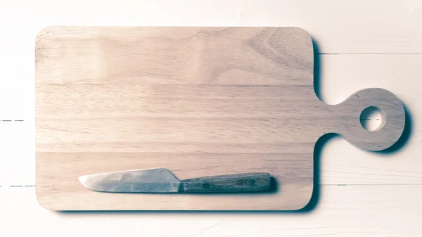 Kitchen knife on cutting board vintage style — Stock Photo, Image