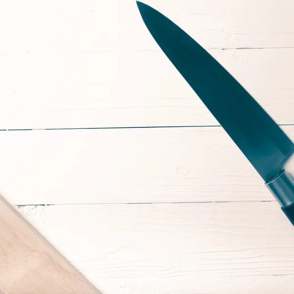 Kitchen knife on cutting board vintage style — Stock Photo, Image