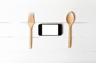 kaşık ve akıllı telefon kavramı sosyal yeme