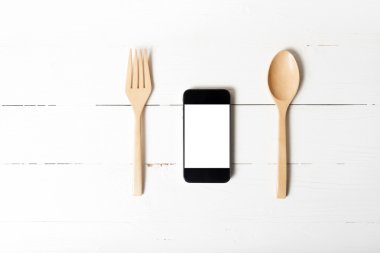 kaşık ve akıllı telefon kavramı sosyal yeme