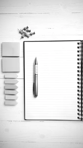 Notepad with office supplies black and white tone color style — Stock Photo, Image