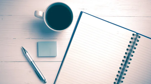 Notepad and coffee cup vintage style — Stock Photo, Image