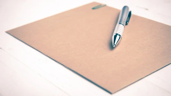 Brown paper with pen vintage style — Stock Photo, Image