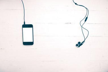 cep telefonu kulaklık vintage tarzı ile