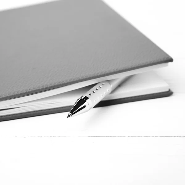 Notebook and pen black and white tone color style — Stock Photo, Image