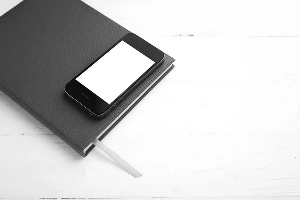 Telefon na notebooka czarno-biały kolor stylu — Zdjęcie stockowe